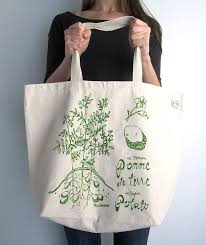 Reusable bags are an environmentally friendly way to bring home the items that you get on a shopping trip or to carry items with you on errands. Recycled Cotton Tote Bag Screen Printed Oversized Reusable Grocery Bag Canvas Shopper Tote Botanical Reusable Grocery Bags Grocery Bag Shopping Tote Bag