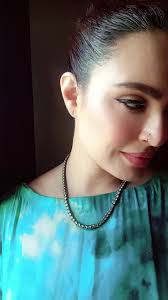 Stylish Tie-Dye Dress Showcase with Beaded Necklace