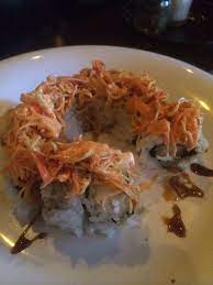 Dancing Crab Roll Shredded Crab On Top Of A Tempura Shrimp And Avocado Roll With Eel Sauce Asian Recipes Sushi Recipes Crab Sushi