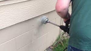 Exhaust fan through wall mount how. Drilling For A New Bathroom Vent Through A Block Foundation Youtube