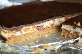 The nutter butter base and chocolate top work in perfect harmony to make these butterfinger nutter butter cheesecake bars a fabulous treat! Butterfinger Nutter Butter Cheesecake Bars Lauren S Latest