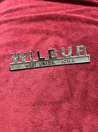 Vintage Car Auto Dealer Chrome Emblem from Wilbur Ford in West Union, IA.