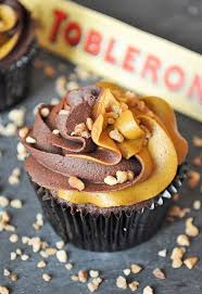 This Toblerone Cupcake Looks So Decadent That I Might Have To Work My Way Up To Eating It Desserts Eat Dessert Cupcake Flavors