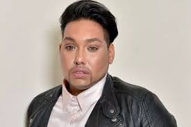 Gay man forced to dress up as a woman