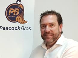 PEACOCK BROS. BUYS AMR HEWITTS IN MAJOR MELBOURNE MERGER