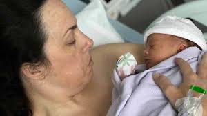 Marathon runner who needed fertility treatment after cervical cancer at 31  names baby born following a single round of IVF after her doctors