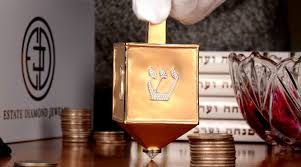The hebrew letters inscribed on a dreidel are a nun, gimel, hey or chai, and shin. Guinness World Records Certifies World S Most Valuable Dreidel The Times Of Israel