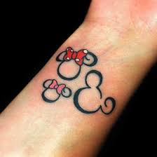 This tattoo design is getting more popular among men and women. Girl Tattoo Ideas Mickey Minnie Mouse Tattoos Cute Tattoos On Wrist Minnie Tattoo