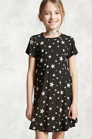 Forever 21 Girls A Knit Dress Featuring An Allover Star Print Swing Silhouette A Round Neckline Short S Girl Fashion Girl Outfits Cute Little Girl Dresses