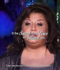 Kelly Pointing Finger at Abby