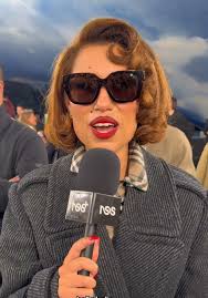 Raye Promotes Olivia Dean's New Album at Burberry Show