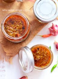 Ia dikenal lewat fotonya yang menempel di kemasan botol sambal. Sambal Bawang Ala Bu Rudy