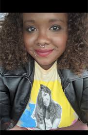 Who can recommend a tattoo artist in Michigan with experience