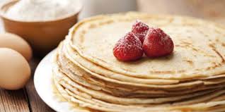 It is traditional to hold a coin. La Chandeleur A French Celebration Learn French Sydney