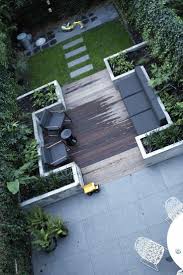 Sitzbereich Mit Wpc Dielen Essbereich Mit Aussenfliesen Stefanie Schw Aussenfliesen Dielen Essbereich Mit Sc Garden Design Small Gardens Small Garden