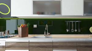 The backsplash space between a countertop and wall cabinets usually can be filled with two or three horizontal tile rows, depending on the size of your tiles. How To Install A Modern Glass Backsplash With Just Spray Paint And Glue Rachael Ray Show