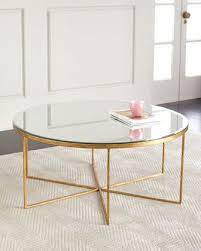 The distinctive finishes work well with gold or silver. Farren Antiqued Mirrored Coffee Table Coffee Table Mirrored Coffee Tables Coffee Table White