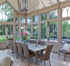 We imagine sitting with friends, glass of wine in hand, lovely food, easy conversation and a romantic view of the garden with it's strategically placed lights highlighting favourite plants and trees. Small Conservatory Dining Room Ideas Uk Novocom Top