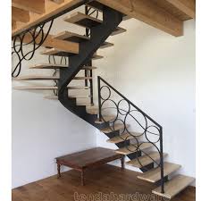 We specialize in custom staircase design & installation. Single Stringer Curved Carbon Steel Wood Stair With Wrought Iron Railing View Carbon Steel Wood Stair Td Product Details From Shenzhen Tenda Hardware Co Ltd On Alibaba Com