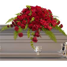 Add sprigs of tiny flowers that are in season in your flower garden to the casket spray. Red Rose Sanctuary Casket Spray Casket Flowers