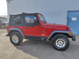 Image result for Flame Red 2005 Jeep