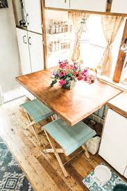 This table boasts a strong rectangular design set on two large pillar legs. Photo 1 Of 881 In Dining Ceiling Photos From Budget Breakdown A Prison Bus Becomes A Couple S First Home For 26k Dwell