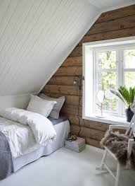 Small Attic Bedroom Twin Bed And Rocking Chair Window Street Facing Wall Is Ship Lap Then Wainscot Attic Bedroom Small Small Attic Room Attic Bedroom Designs