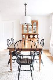 With the overall goal to really brighten up our dining room space, i decided to chalk paint the legs of the table, the backs and legs of the chairs with rustoleum chalk paint in the shade linen white, and to sand and stain the table top and chair tops with rustoleum fast dry wood stain in the shade kona. Painting Dining Room Chairs The Little By Little Home