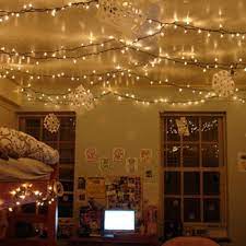 11 Unexpected Ways To Decorate Your Dorm With Holiday Lights Christmas Lights In Bedroom Christmas Dorm College Room