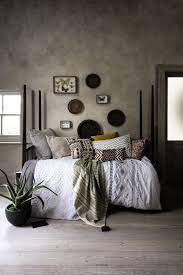This Bohemian Bedroom Idea Has A Touch Of Tribal Influence Think Geo Prints Tactile Finishes And Plent Scandi Bedroom Bedroom Inspirations Earthy Home Decor
