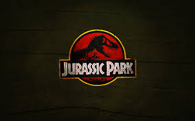 For many years tyrannosaurus held that record (although bits and pieces of carcharodontosaurus and spinosaurus showed that they were as large as any individual t. 44 Jurassic Park Logo Wallpaper On Wallpapersafari