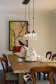 The bottom of a pendant should be 30 inches from the surface of your dining table. Dining Room Lights And Art Dining Lighting Pendant Lighting Dining Room Dining Room Contemporary