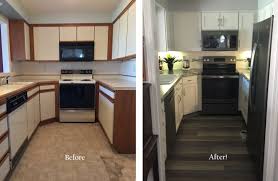 A brilliant center island in staggered heights accommodates the culinary master and dining enthusiast. White Laminate Kitchen Cabinet Doors Novocom Top