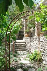 Arbors Perfect For Narrow Side Yards Or To Create Walkway Through The Garden By Atelier Nelumbo Gard With Images Provence Garden Mediterranean Landscaping Garden Styles
