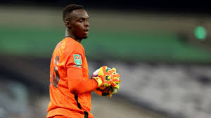 Edouard mendy celebrating a win for reims over marseille. Edouard Mendy Explains Relationship With Chelsea Goalkeeping Rival Kepa