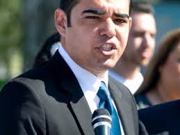 Dunn takes aim at Garcia over tax liens