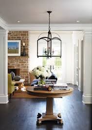This sofa table boasts an. 19 Round Entry Table Ideas Round Entry Table Entry Table Foyer Table