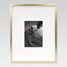 Photo size 10 x 8 (25cm x 20cm) composition metal, glass, paper, velvet. Thin Brass Profile Frame Threshold 153 Threshold S Thin Profile Brass Frame Offers A Modern Minimalist Way To Sho Frames On Wall Photo Room Gallery Frame