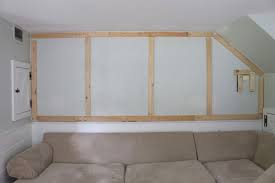 Cut your wood we used 1x2 furring strips. Scrap Wood Wall Installation Jaime Costiglio