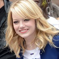 Medium curled haircut with bangs for round faces The Best Celebrity Inspired Side Bang Haircuts