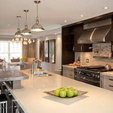 Engineered quartz countertops by caesarstone cabinets. Dark Brown Cabinets Contemporary Kitchen Leslie Goodwin Photography