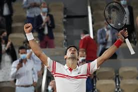 Novak djokovic of serbia celebrates after beating stefanos tsitsipas of greece in the men's singles final at the 2021 french open tennis tournament sunday at roland garros in paris. Tgmouin99 2dmm