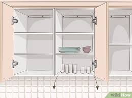 How to remove kitchen cabinets and countertops. 3 Ways To Remove Kitchen Cabinets Wikihow