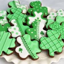 On a glass plate with placemat, napkin, shamrock and tiny leprechaun hat on a wood table background 97 Irish Cookies Ideas In 2021 Irish Cookies St Patrick S Day Cookies Cookies