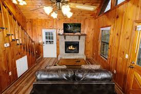 Rooms open to balconies or patios. Pigeon Forge Gatlinburg Cabins By The River Colonial Properties