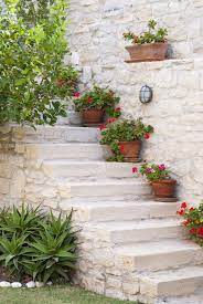 A large finely modeled english garden statue of diana, of composition stone, featuring the huntress in a standing pose in the round, with long bow and a. 10 Garden Ideas To Steal From Greece Gardenista Mediterranean Garden Design Greek Garden Mediterranean Garden