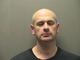 Late-night pursuit by state trooper ends with arrest of wanted Benton man