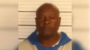 Suspect arrested in shooting death of football coach
