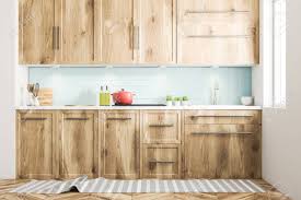 Kitchen with dark wood cabinetry. White Scandinavian Style Kitchen Interior With Blue Tiled And Stock Photo Picture And Royalty Free Image Image 103722030