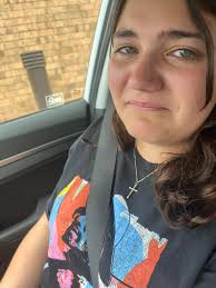 Here are some pictures of Mrs. Sandrock as she watched her past students  sing "That's Our Melanie" flash mob style❤️